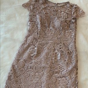 Champagne coloured 3/4 length dress.